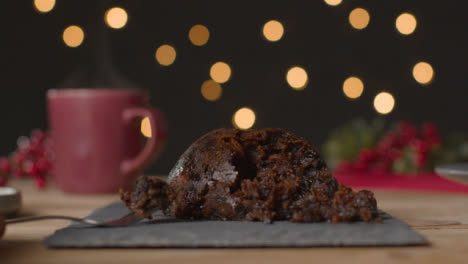 Tracking-Shot-Approaching-a-Christmas-Pudding-and-Fork