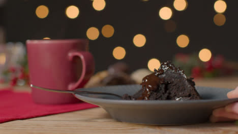 Close-Up-Shot-of-Chocolate-Christmas-Cake-Placed-On-Table
