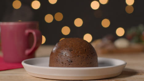 Close-Up-Shot-of-Steaming-Christmas-Pudding