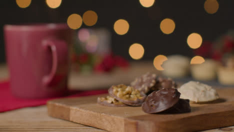 Sliding-Shot-of-Biscuits-On-Festively-Decorated-Table