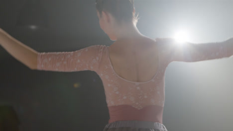 Mid-Shot-of-Ballet-Dancer-Dancing-In-Front-of-Spotlight