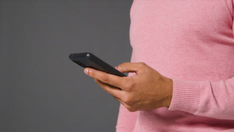 Close-Up-Shot-of-Man-Texting-and-Answering-a-Phone-Call