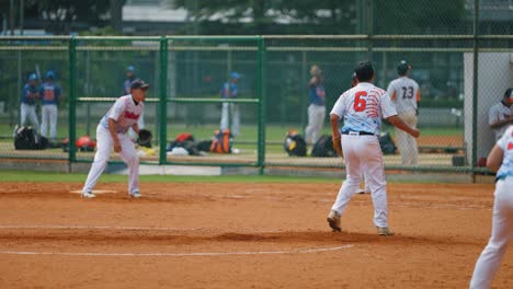 Long-Shot-of-Young-Men-Playing-Softball-In-Jakarta-