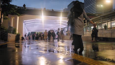 Tracking-Shot-of-People-Walking-in-the-Rain