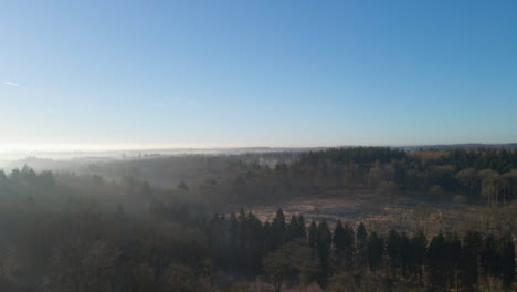 Drone-Shot-Rising-Up-Over-Vast-Countryside-Landscape-