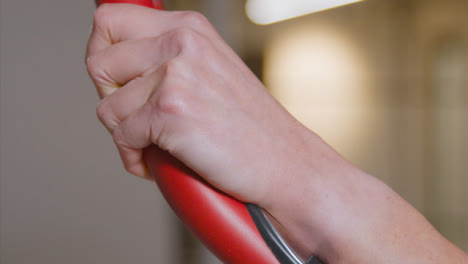 Close-Up-Shot-of-Woman's-Hands-whilst-Working-Out-at-Gym