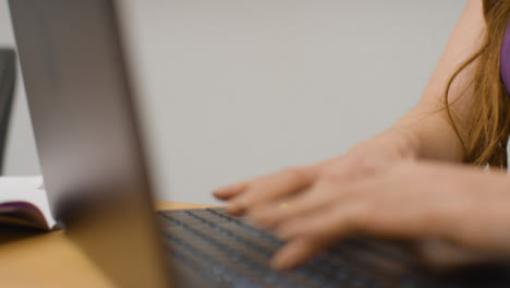 Close-Up-Shot-of-Young-Woman-On-Computer