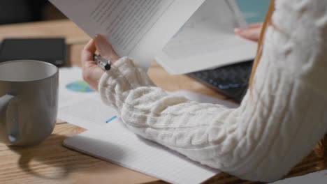 Mid-Shot-of-Woman-Looking-at-Paper-Work