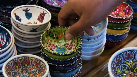 Close-Up-Shot-of-Man-Looking-at-Bowls