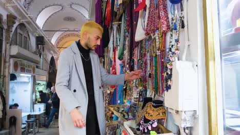 Mid-Shot-of-Man-Browsing-Jewellery