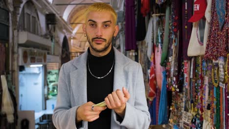 Mid-Shot-of-a-Man-Counting-His-Money