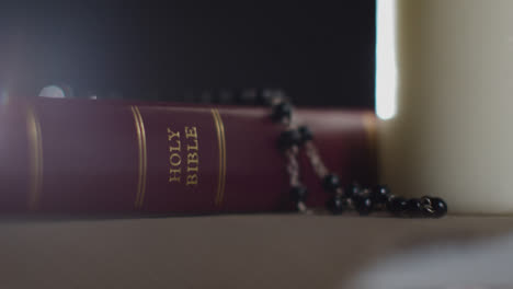 Close-Up-Shot-of-a-Bible-and-a-Crucifix