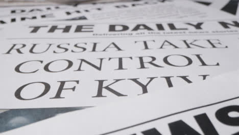 Slow-Tracking-Close-Up-Newspaper-Headline-Russia-Takes-Control