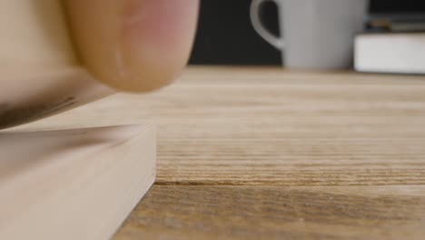 Extreme-Close-Up-of-Man-Flicking-Pages