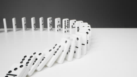 High-Angle-Shot-Of-some-Dominoes-Falling-