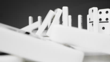 Close-Up-of-Dominoes-Falling-