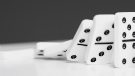 Mid-Shot-of-Dominoes-Knocking-Over-04