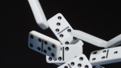 Close-Up-of-Dominoes-Being-Dropped-03