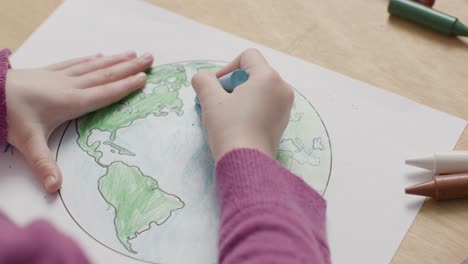 Overhead-Shot-of-Little-Girl-Colouring