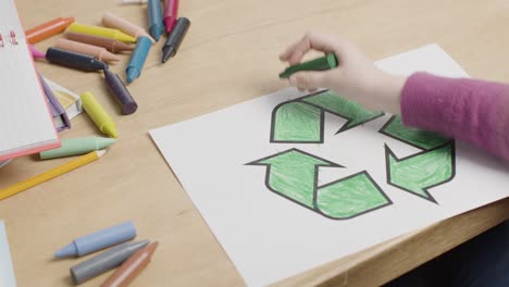 Overhead-Shot-of-Kid-Using-Green-Crayon