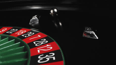 Close-Up-of-Roulette-Ball-Falling-into-Hole