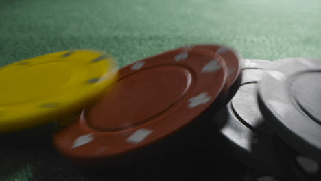 Close-Up-Shot-Of-Someone-Dropping-Tokens