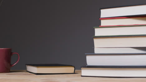 Tracking-Shot-of-Books-and-Mug-02