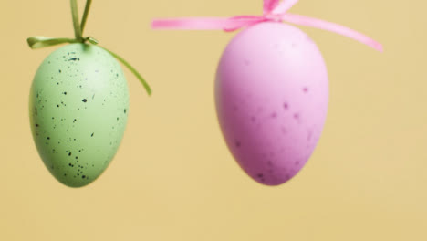 Tracking-Shot-of-Colourful-Easter-Eggs-with-Copy-Space