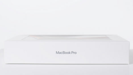Sliding-Shot-of-Brand-New-Macbook-Pro-01