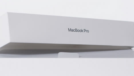 Sliding-Shot-of-Brand-New-Macbook-Pro-04