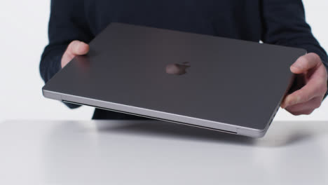 Close-Up-Shot-of-MacBook-Pro-Being-Unboxed-03