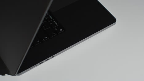 High-Angle-Shot-of-Brand-New-Apple-MacBook-Pro-01