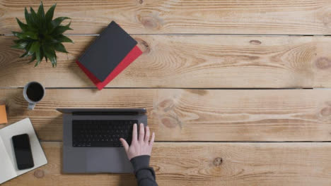 Top-Down-Shot-of-Person-Working-with-New-MacBook-Pro-with-Copy-Space-03