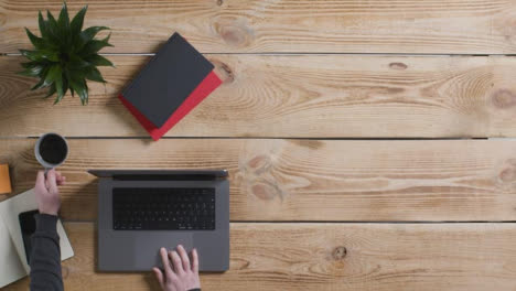 Top-Down-Shot-of-Person-Working-with-New-MacBook-Pro-with-Copy-Space-04