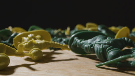 Tracking-Shot-Through-Fallen-Toy-Soldiers