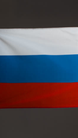 Vertical-Pedestal-Shot-of-Russian-Flag-