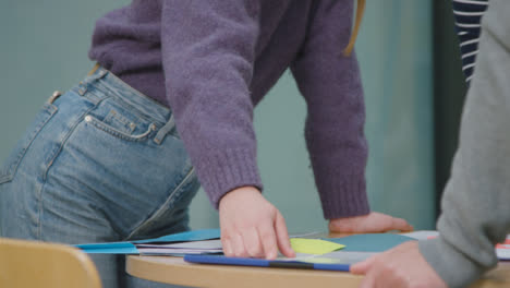 Close-Up-Shot-of-Students-Working-Together-On-Group-Project-01