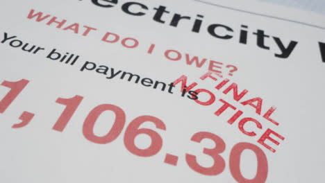 Close-Up-Of-Electricity-Bill-Stamped-With-Final-Notice-Rise-In-Cost-Of-Living