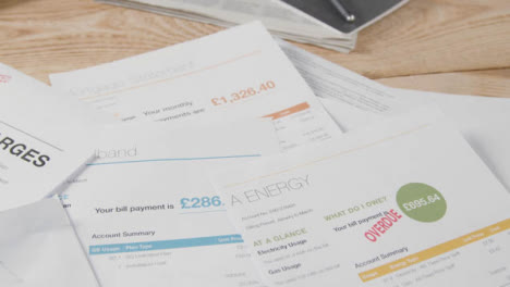Close-Up-Of-Overdue-UK-Utility-And-Service-Bills-On-Table-2
