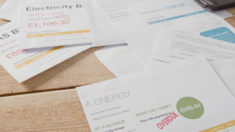 Close-Up-Of-Overdue-UK-Utility-And-Service-Bills-On-Table-4