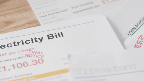 Close-Up-Of-Overdue-UK-Utility-And-Service-Bills-On-Table-6