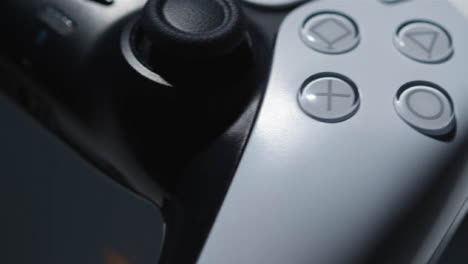 Studio-Close-Up-Of-Video-Game-Controller-Rotating-White-Background-2