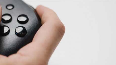 Studio-Close-Up-Shot-Of-Hands-Playing-Video-Game-Controller-1