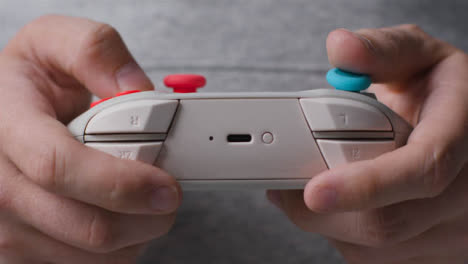 Front-On-Close-Up-Shot-Of-Hands-As-Man-Plays-With-Video-Game-Controller-1