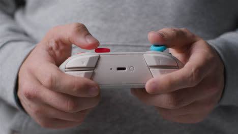 Front-On-Close-Up-Shot-Of-Hands-As-Man-Plays-With-Video-Game-Controller-2
