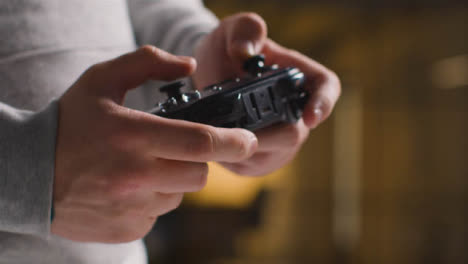 Side-On-Close-Up-Hands-As-Man-Plays-With-Video-Game-Controller-At-Home-7