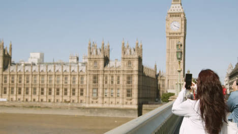 Clock-Tower-Big-Ben-And-Houses-Of-Parliament-People-Crossing-Westminster-Bridge-London-UK