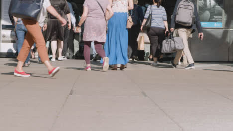 Close-Up-London-Commuters-Feet-Legs-Walking-Towards-Escalator-Train-Or-Tube-UK