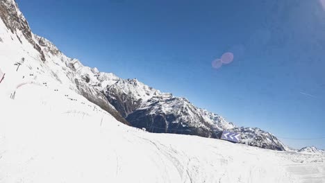 POV-Shot-Of-Skier-Skiing-Down-Snow-Covered-Mountain-Slope-Solden-Austria-Tunnel