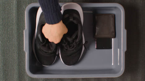 Airport-Security-Check-With-Shoes-Camera-Phone-Wallet-Tray-Ready-For-X-Ray-Scanner